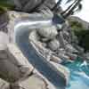 Gray colored swimming pool slide